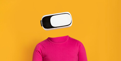 A person wearing modern virtual reality goggles engages with technology. The vibrant yellow...