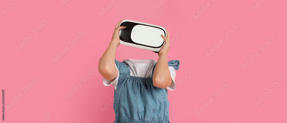 Aufkleber a child engages with a virtual reality device, holding it in front of where their head would be, sho