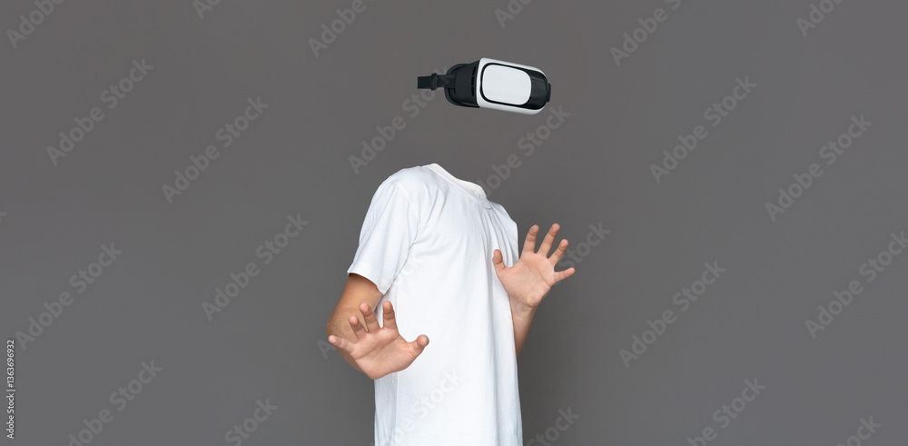 Poster A user engages with a virtual reality headset, immersed in modern technology and experiencing augmented reality. The background is simple, enhancing focus on the gadget.