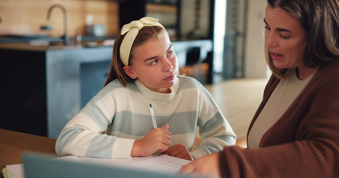 Girl, mom and help with homework, teaching and support for development with education at kitchen counter. Child, mother and daughter with progress, learning and guide for assessment in family house