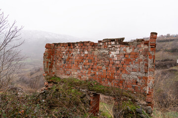 Ruins of a Brick Structure in a Rural Landscape
