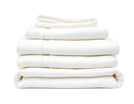 Pile of neatly folded white bed sheets