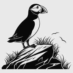 A puffin standing on a rock image silhouette design vector art and illustration