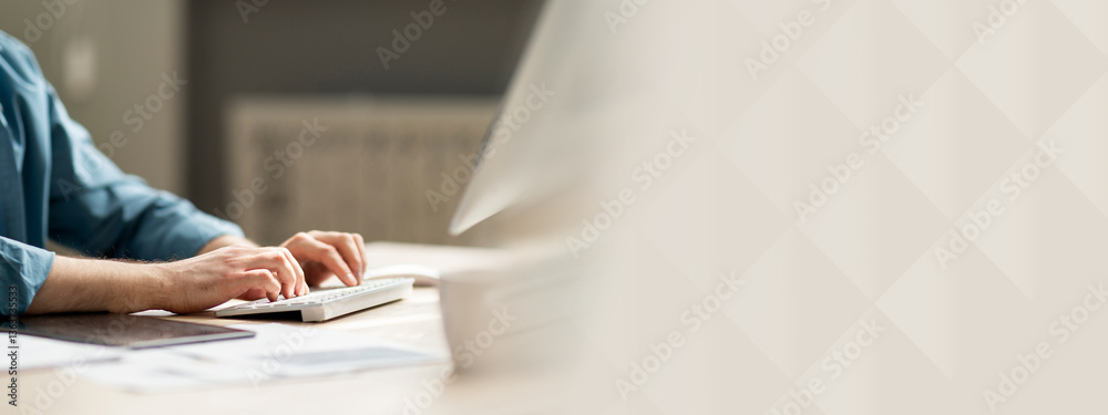 Aufkleber Young man sitting at desk and typing on computer keyboard, cropped shot of guy employee using pc in office, working online, businessman answering emails, side view, closeup