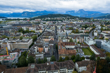 Stunning aerial footage of Kapellbrücke, the iconic Chapel Bridge, showcasing the picturesque beauty of Lucerne, Switzerland.