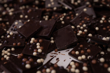 Handcrafted premium chocolate pieces filled with crunchy toppings, offering a delightful combination of rich flavor and texture.