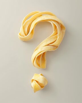 Naklejki Creative pasta shaped like a question mark floating in mid air with a minimal background 