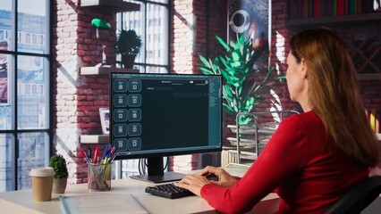 Professional person engaging with an AI chatbot on a computer screen, exploring power of digital assistance through artificial intelligence. Solutions for assistance at desktop. Camera B.