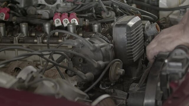 Repairing Old Car Engine in Repair Shop Footage.