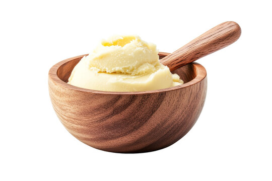 Fototapeta Shea butter in wooden bowl with wooden spoon, cut out transparent