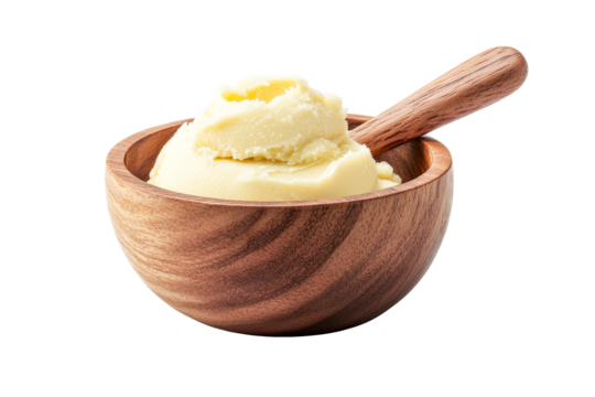 Shea butter in wooden bowl with wooden spoon, cut out transparent
