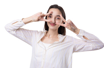 Smiling woman raised her hand palm up and forward like waving.