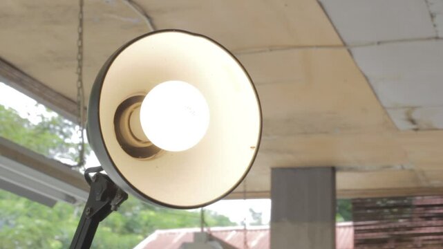 a round decorative lamp that lights up using a foot. suitable for room decoration