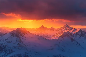 Gardinen Sunset over snow-capped mountains creates a breathtaking view in the winter landscape © Ann