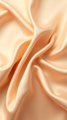 Fototapeta premium Beige cream vanilla light brown silk satin fabric. Soft wavy folds in the fabric. Wedding, anniversary, valentine, love, tender. Beautiful abstract background with space for your design.