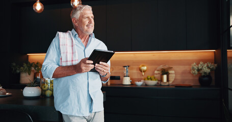 Mature man, tablet and idea with cooking tutorial, dinner method or online guide in home. Thinking, learning and senior person in kitchen with nutritionist blog, diet research or steps in meal prep