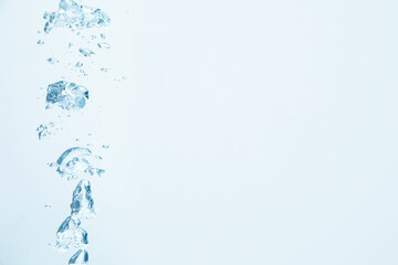 Many water bubbles on light background, closeup. Space for text