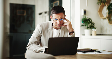 Laptop, remote and thinking work with man in home office for investment or portfolio management. Computer, idea and stock market with freelance trader in apartment to research economic trends