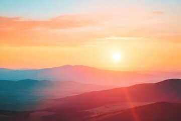 Obraz premium Beautiful sunrise over mountain ranges with vibrant colors in the sky