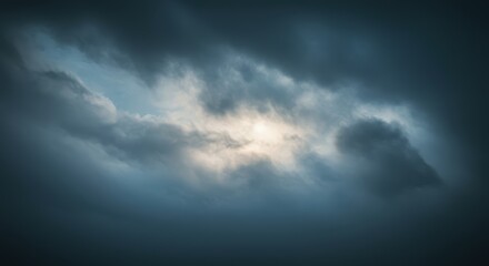 Obraz premium Dramatic Cloudscape with Sunlight Breaking Through Overcast Sky Above