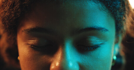 Calm, neon and child with eyes closed, light and closeup of face, unique and artistic with glow or art deco. Fantasy, creative and person with color for imagination, self expression and experimental