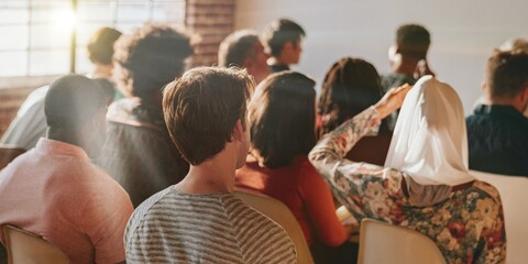 Diverse group of people audience sit in business seminar, focus on seminar presentation. Diverse people group, business seminar meeting. Diverse audience, group of people in seminar presentation
