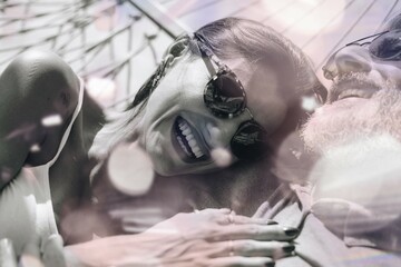 Fototapeta premium Couple resting in a hammock remix