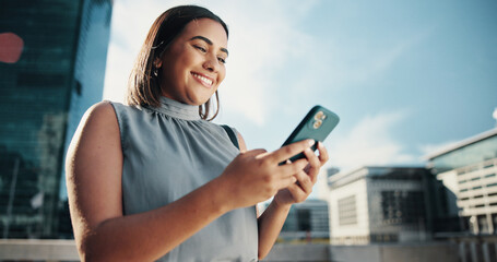 City, businesswoman and happy with smartphone for search, information and real estate agent. Low angle, female person and realtor with mobile for property listing, application and scroll on website