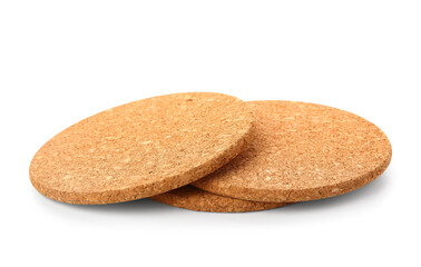 Round cork table coasters on white background