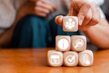 Visual representation of a management information system using digital icons and wooden blocks, symbolizing modern business solutions. © Satori Studio