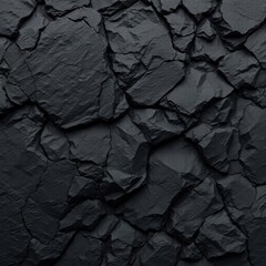 Black grunge background. Rock background. The texture of the mountains. Close-up. Black volumetric stone background.
