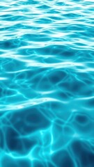 Obraz premium Blue-green water background. Reflection of light on the wavy surface of the water. Ripples. Beautiful teal background with copy space for design. Web banner. Wide. Panoramic.