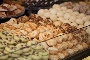 Delicious assortment of traditional sweets displayed in a shop