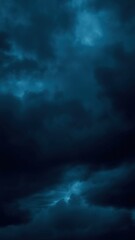 Obraz premium Black blue evening night sky with clouds. Dark dramatic sky background. Before the storm, thunderstorm, rain. Frightening, ominous, moody, creepy atmosphere.