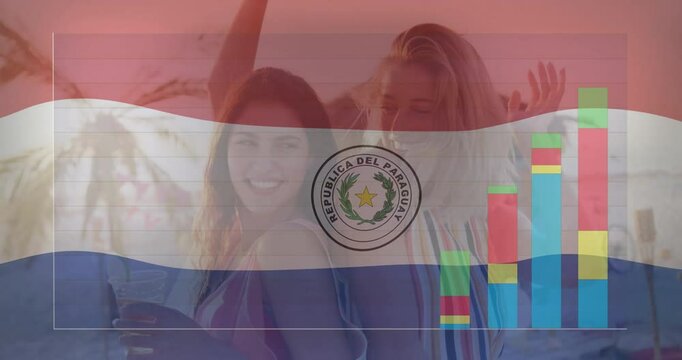 Animation of Paraguay flag overlaying people at beach with colorful charts