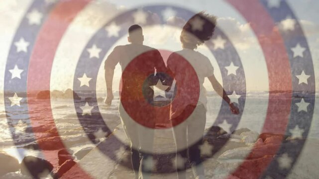 Holding hands on beach, couple walking over American flag pattern with animation