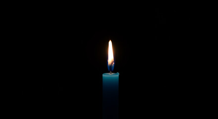Single Teal Candle Burning in Darkness - Symbol of Hope, Remembrance, and Peaceful Light