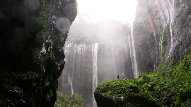 Women Base of Tumpak Sewu Waterfall Java Indonesia Epic Drone
