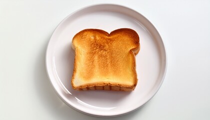 Golden Toast on Plate: A top-down view showcases a perfectly toasted slice of bread, nestled on a pristine white plate, a simple yet satisfying breakfast essential.