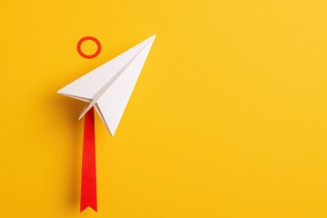 Minimalist White Paper Airplane With Red Ribbon Against Vibrant Yellow Background