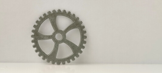 Industrial gear mechanism workshop metal component minimalist design side view engineering concept