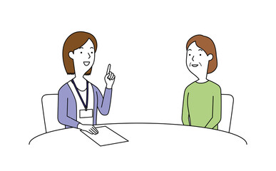 女性の相談員にアドバイスを聞く高齢の女性