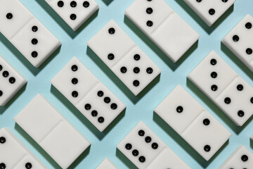 White dominos blocks on blue background