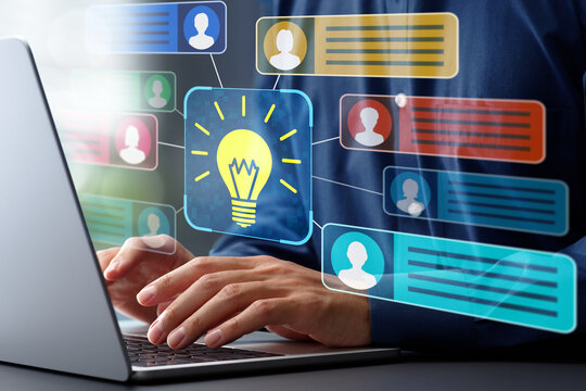 Knowledge sharing and management. Discussion forums for project management within team collaboration platform. Businessman using laptop computer for messaging team.