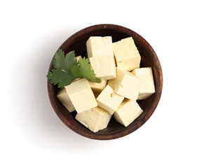 Bowl with cut tofu cheese isolated on white background