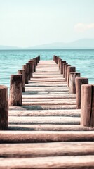 Fototapeta premium Wooden pier extending into calm waters, bathed in natural light, evoking tranquility and timeless serenity. 