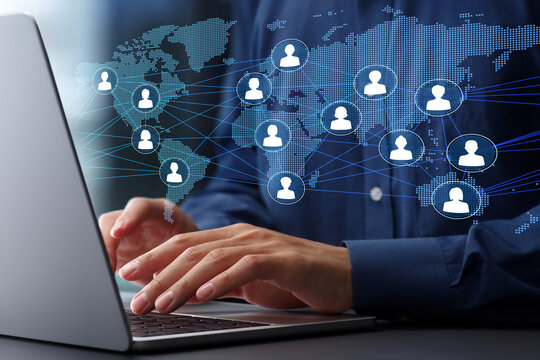 Global talent network and cross-border collaboration. Businessman using laptop computer to communicate with the team. - Powered by Adobe