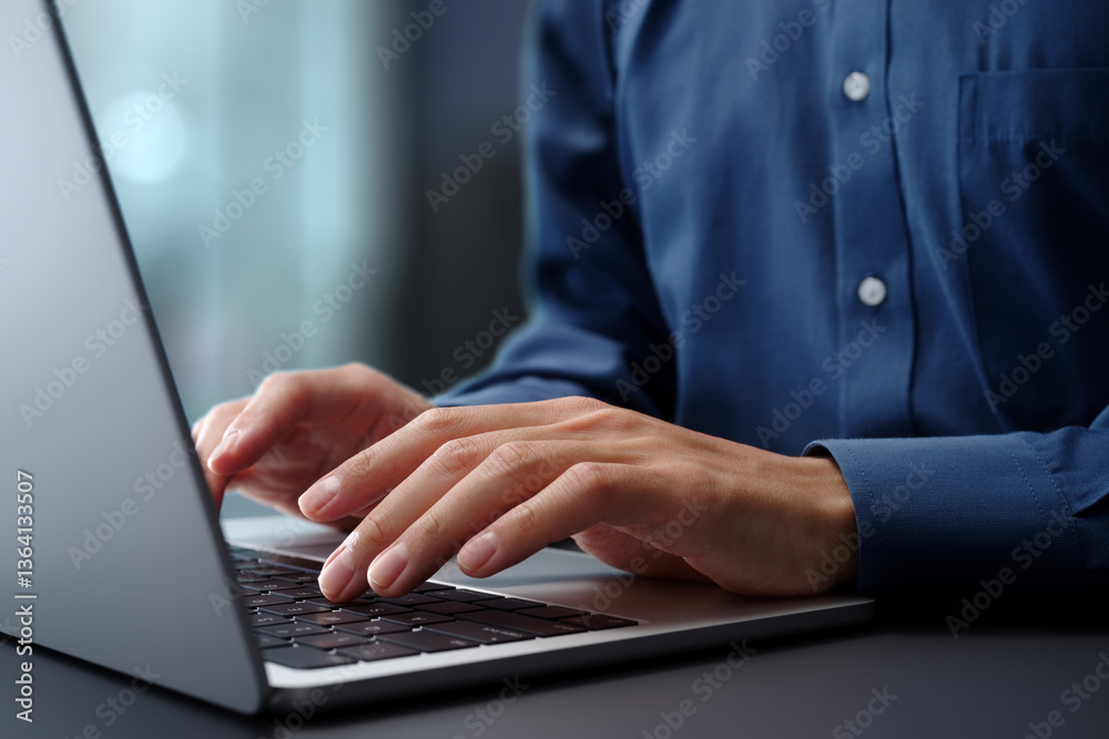 Poster Hands typing on laptop computer keyboard. Businessman working at desk in office. Using technologies in business.