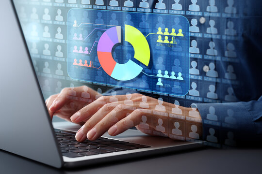 Customer segmentation and group analytics. Statistical marketing strategy and analysis of customer behavior data. Circle graph and customer database icons. Analyst using laptop computer.
