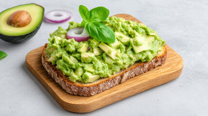Creamy avocado toast topped with fresh herbs and onions wooden board. Perfect for healthy snack